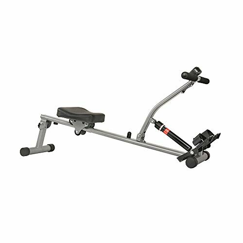 Compact rowing machine with seat and foot pedals.